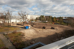 After demolition of the old buildings, the construction site is now prepared for the new building.