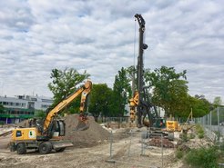 Heavy equipment is on site to secure the excavation pit.
